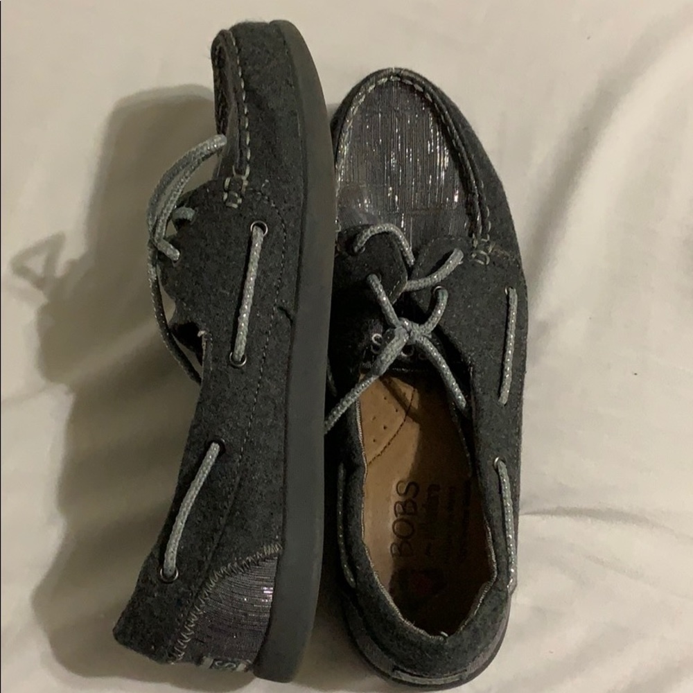 Women’s grey and silver boat shoes